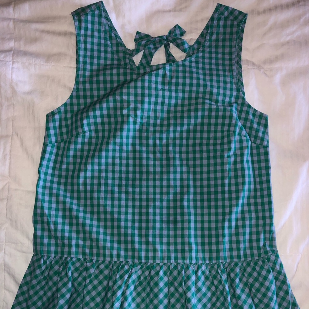 Sleeveless peplum top